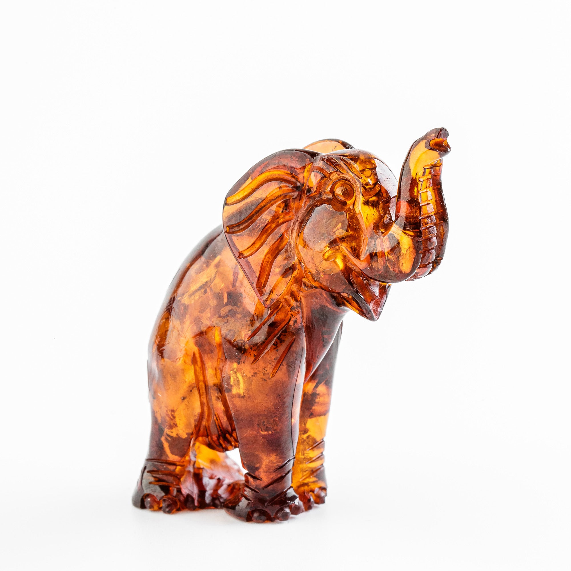 Hand-Carved Baltic Amber Elephant Sculpture – Cognac