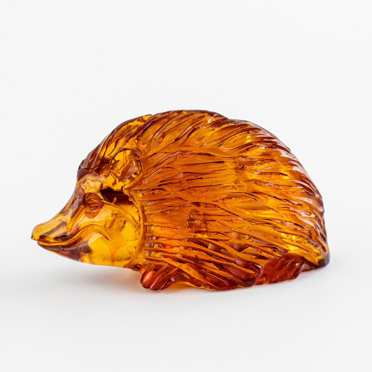 Hand-Carved Baltic Amber Hedgehog Sculpture – Cognac