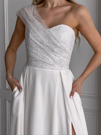 White bridal shower maxi gown with modern silhouette
