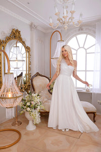 Elegant white corset mini dress for bridal occasions